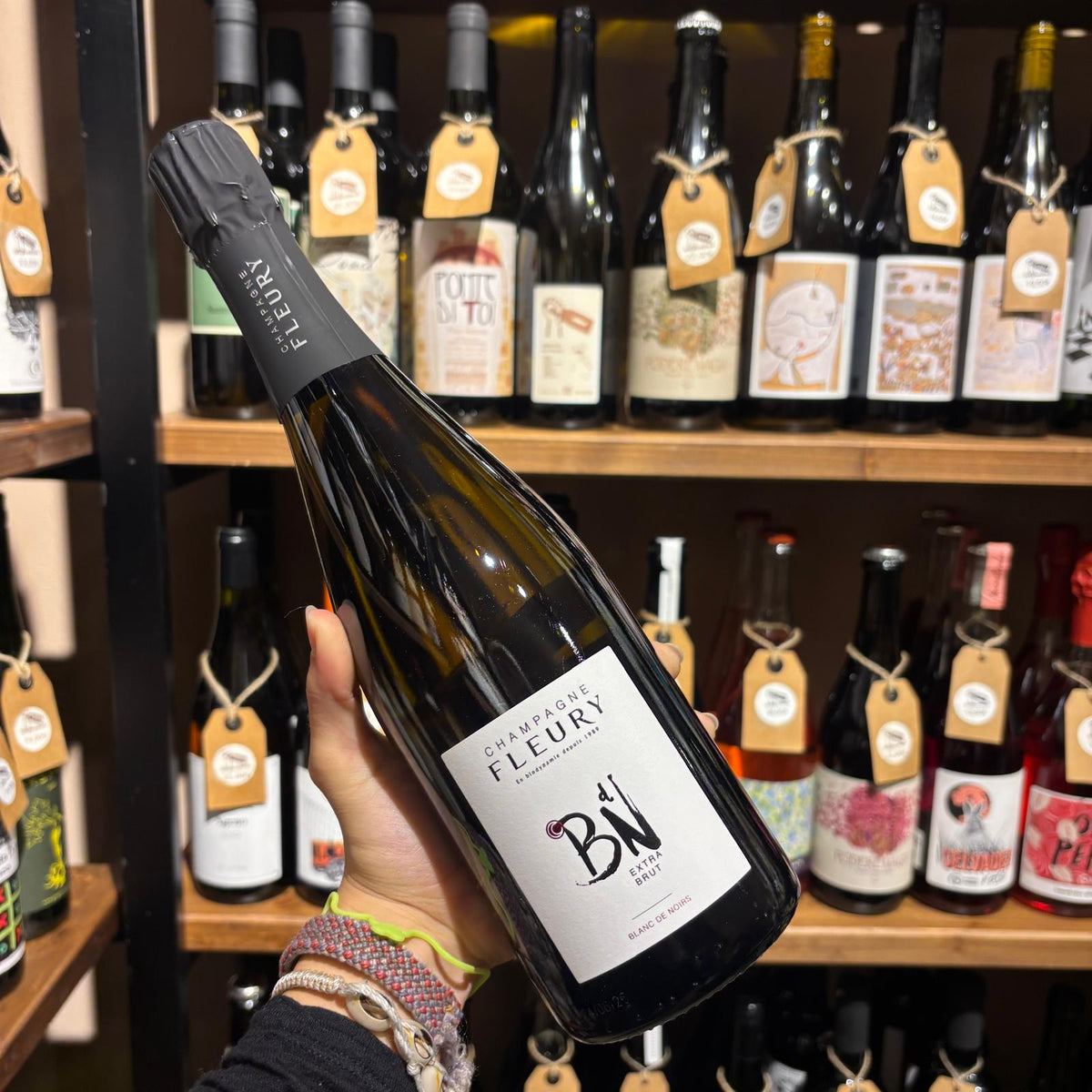 Bottiglia di Champagne Blanc de Noirs di Fleury.