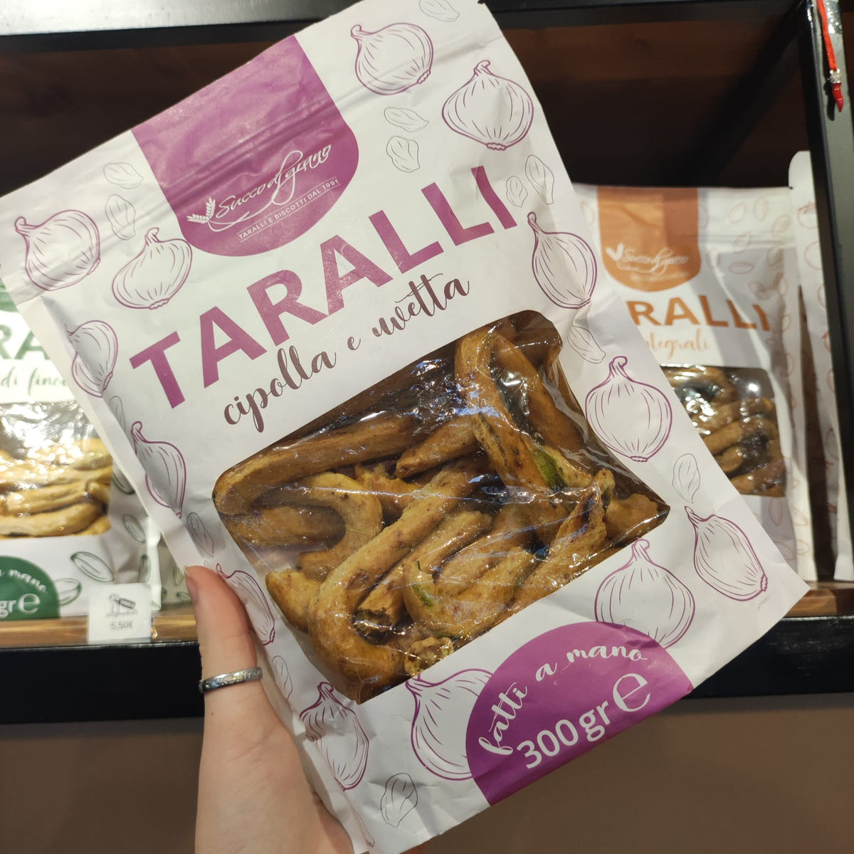 Confezione di Taralli Cipolla e Uvetta 300 g Succo di Grano.